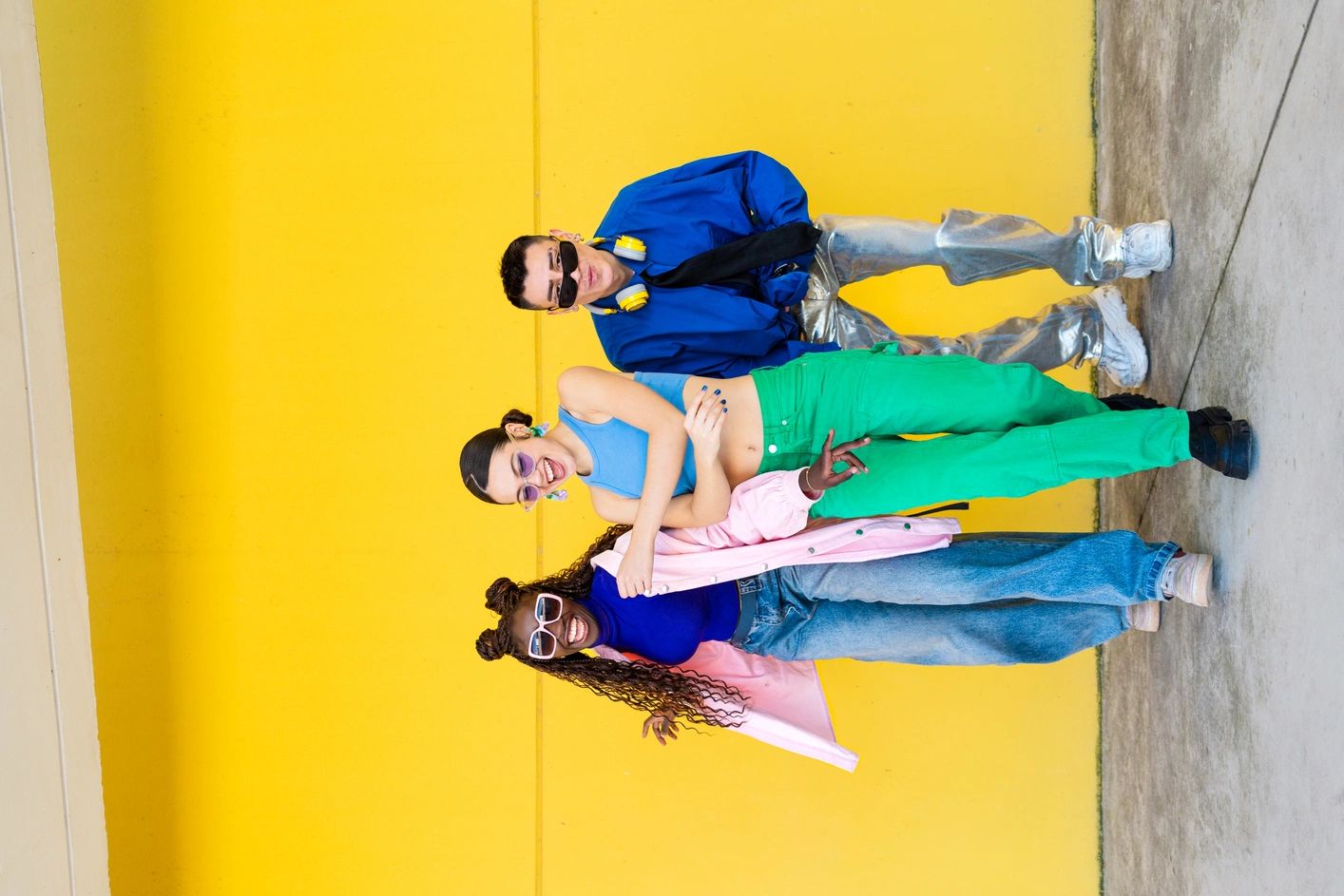 Fashion-forward group portrait with vibrant energy