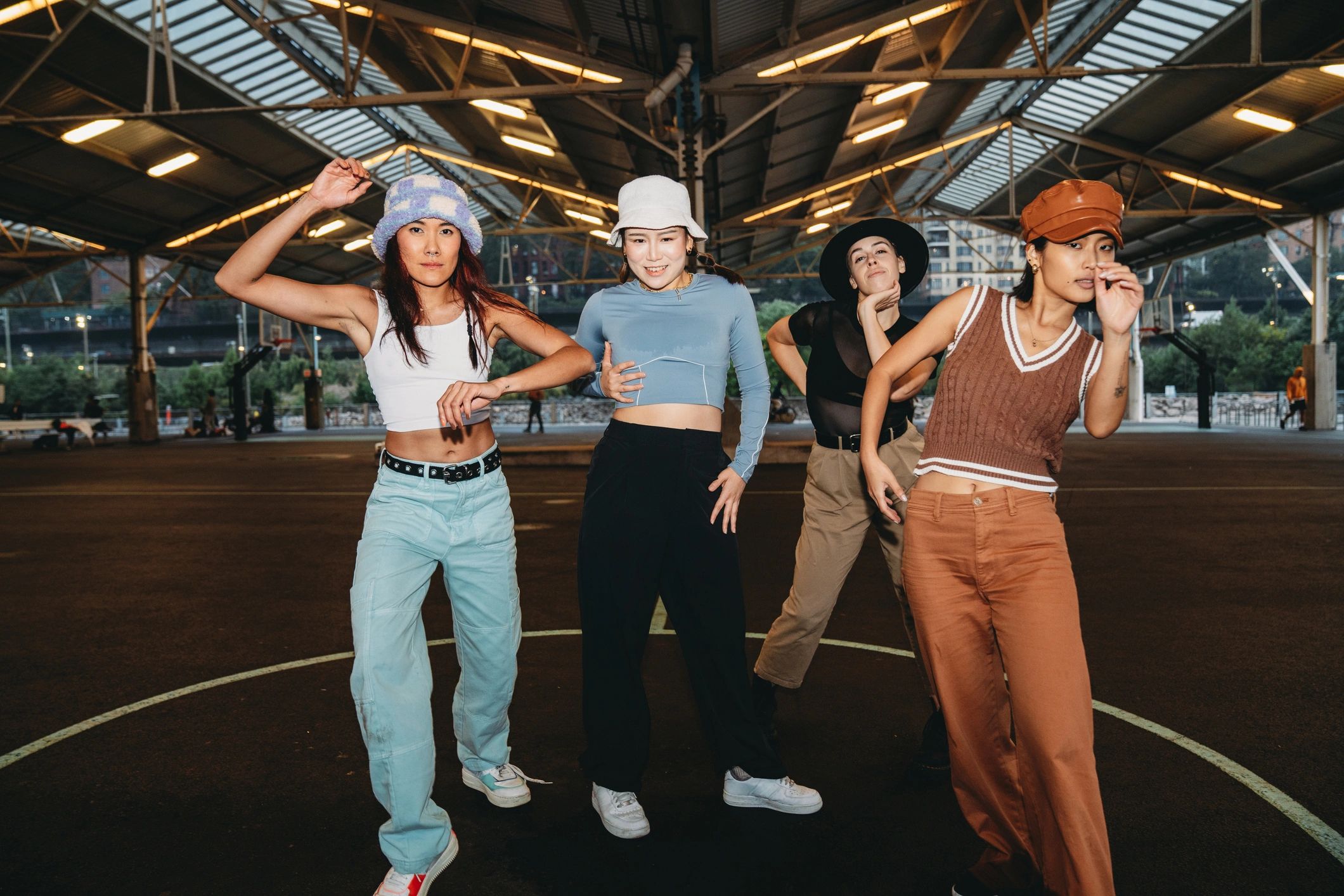 Group of stylish women expressing movement and individuality together
